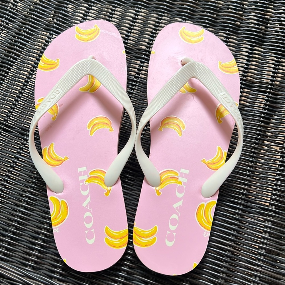 Pink Coach flip-flops